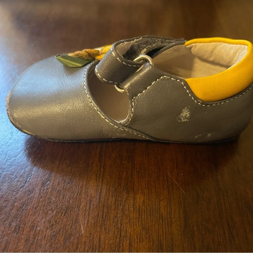 Gray Baby Shoes with Yellow Flower Accent